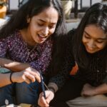 teenager-painting-outdoors