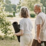 elderly-couple-walking-park