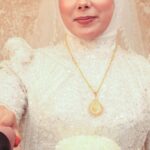 Macron-Xi-Jinping-handshake