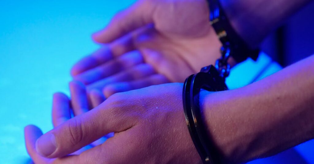woman-handcuffed-airport