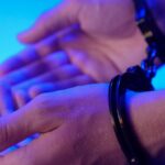 woman-handcuffed-airport