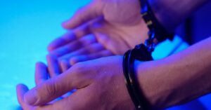 woman-handcuffed-airport