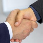 Xi-Jinping-Kim-Jong-un-handshake