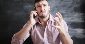 man-looking-phone-anxious