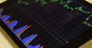Illustration de Actions ou Or : Quel placement est le plus rentable à long terme ? stock-market-graphs